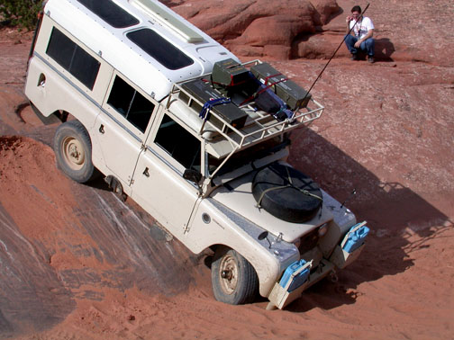 Land Rover Dormobile touching sand